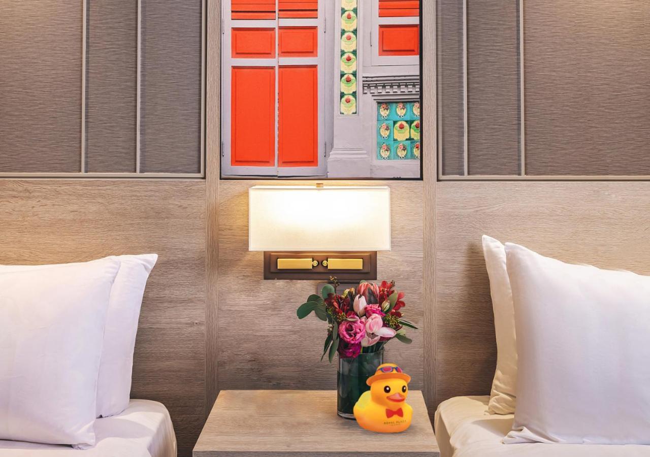 Royal Plaza On Scotts Hotel Singapore Exterior photo A rubber duck on a bedside table
